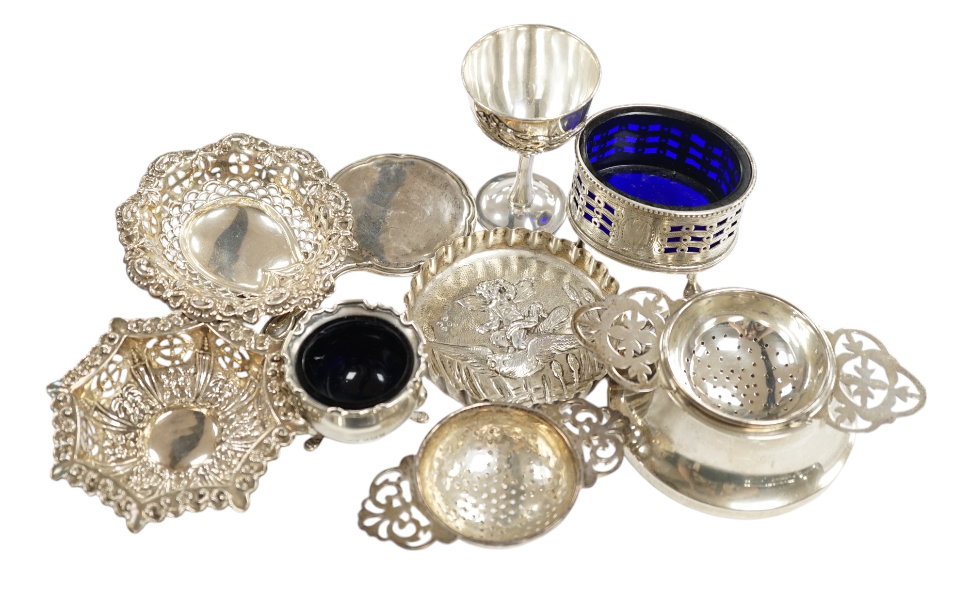 Sundry small silver including a, tea strainer, handbag mirror, pin dish, pair of bonbon dishes, two condiments and a Chinese white metal egg cup?. Condition - fair